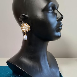 Pendientes de perlas de algodón. Nueva moda 2025
