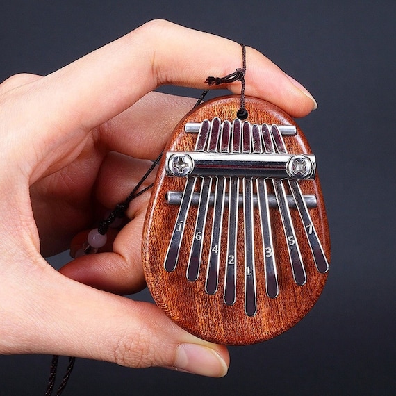 8 Key Mini Kalimba exquisite Finger Thumb Piano Marimba Musical good  accessory Pendant Gift
