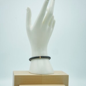 Hematite and Gold Wheel Bracelet