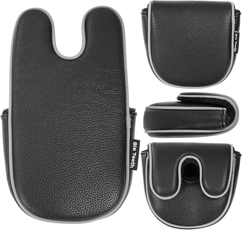 May include: A black golf putter headcover with a textured surface and grey piping. The cover features a U-shaped cutout and a small black tag with the white text Big Teeth. The set includes multiple views showing the cover open and closed.