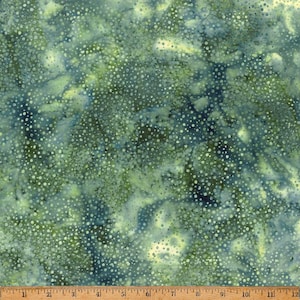 May include: Green and blue fabric with a white polka dot pattern. The fabric has a tie-dye effect.