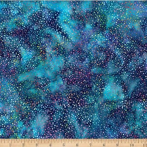 May include: A fabric with a dark blue background, speckled with small, colorful dots in shades of white, pink, yellow, and blue. The fabric has a watercolor effect, with areas of lighter blue and darker blue. The pattern resembles a starry night sky.
