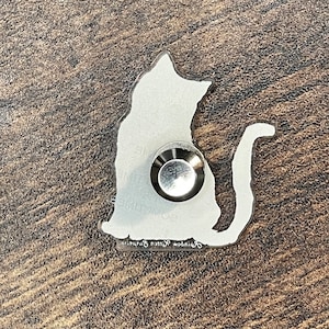 Similar pin displaying locking pin back