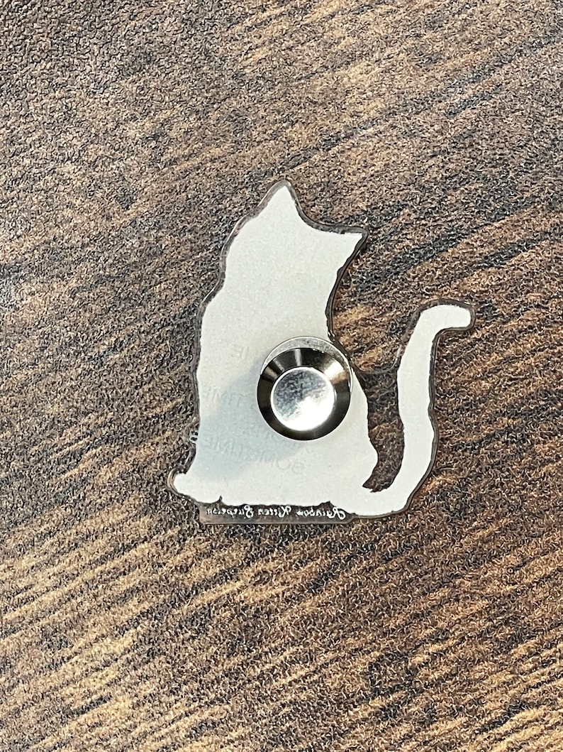 Similar pin displaying locking pin back