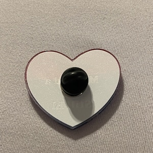 Heart Shaped Acrylic pin. Bi flag pink purple blue waving stripes. Text reads "Married a Guy Still Bi