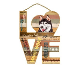 May include: Wooden sign shaped like the word "LOVE" with a Siberian Husky dog image in the heart. The sign features words related to dogs, such as "woof", "best friend", "paw prints", and "long walks".