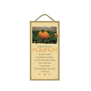 May include: A rustic wooden sign with a fall-themed image of three pumpkins and the text "Advice from a PUMPKIN" with a list of advice: Be well-rounded, Get plenty of sunshine, Give thanks for life's bounty, Have a thick skin, Keep growing, Be outstanding in your field, Think big!"