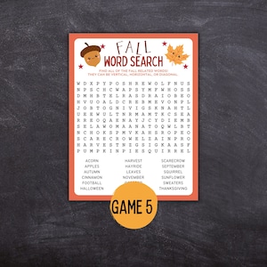 May include: A printable fall-themed word search puzzle with a red, orange, and white color scheme. The puzzle features a cartoon acorn and a cartoon leaf with a smiling face. The words to find are listed below the puzzle. The puzzle is labeled "Game 5".
