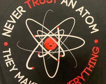 Gently Used Never Trust An Atom Women’s t shirt Large
