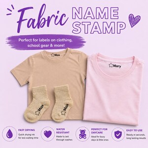 May include: A product image featuring a fabric name stamp. The image shows a tan t-shirt and socks, and a pink t-shirt, each labeled with a name. The text on the image says "Fabric Name Stamp" and "Perfect for labels on clothing, school gear & more!"