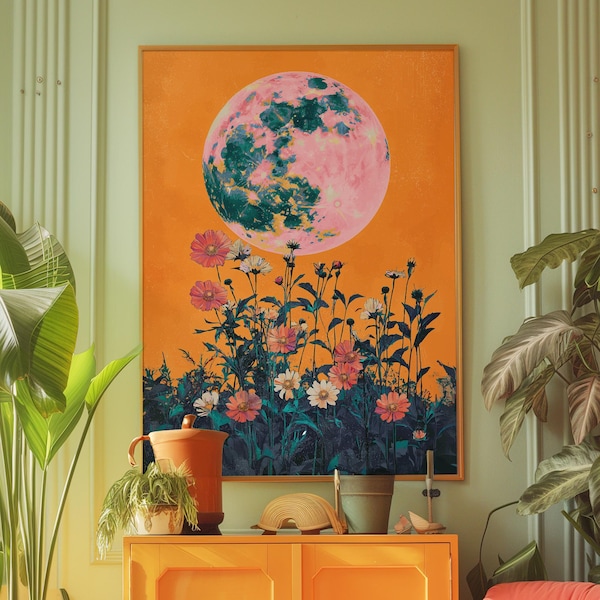 Puede incluir: Una impresión enmarcada con una gran luna rosa y verde sobre un campo de flores rosas y blancas sobre un fondo naranja.