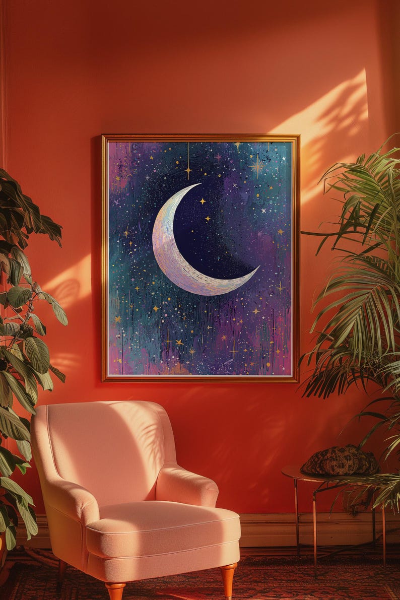 May include: A framed print of a crescent moon with a white and gold design against a dark blue and purple starry night sky.