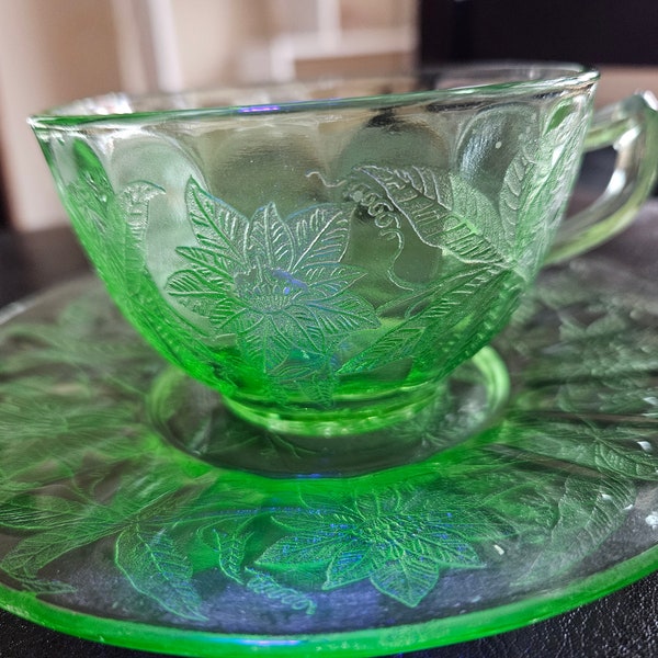 Etched floral uranium glass cup and saucer