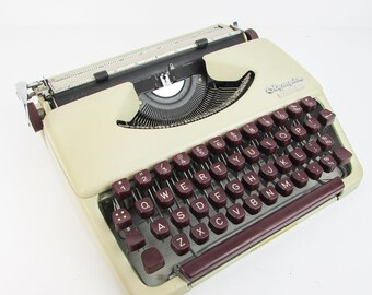 Vintage working typewriter Olympia Splendid 66 1960s retro portable West Germany