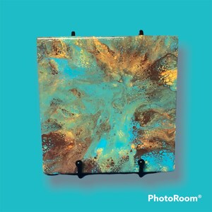 Ceramic painting with stand.