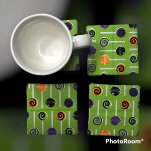 Halloween themed ceramic coasters.