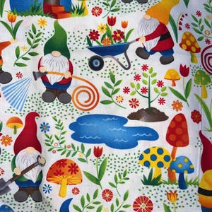May include: A white fabric with a repeating pattern of gnomes, mushrooms, flowers, and a blue pond. The gnomes are wearing red, blue, and yellow hats and are holding gardening tools. The mushrooms are red, yellow, and white with polka dots. The flowers are red, yellow, and white.