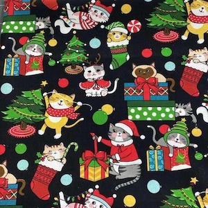 May include: A dark blue fabric featuring a repeating pattern of cartoon cats in festive holiday attire. The cats are depicted with Santa hats, scarves, and holding gifts, candy canes, and ornaments. Christmas trees and gift boxes are also included.