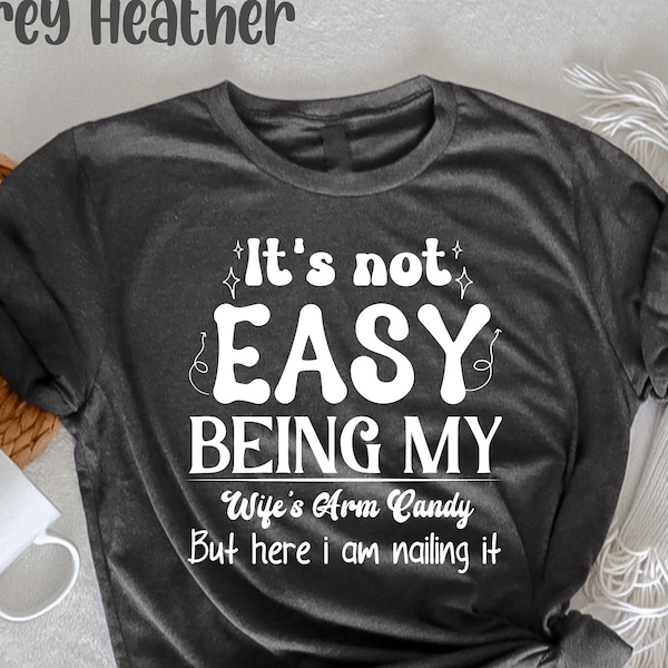 It's Not Easy Being My Wife's Arm Candy But Here I Am Nailing It T-Shirt, Husband Gift Shirt, Husband Birthday, Dad Joke Shirt, Dad Shirt