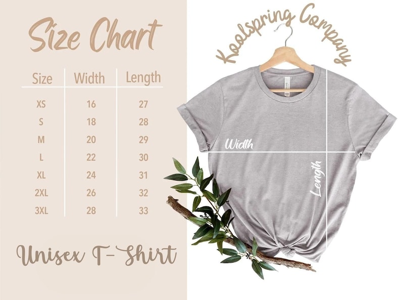 May include: Size chart for a unisex t-shirt, showing width and length measurements in inches for sizes XS to 3XL. The chart is printed on a light brown background. The image also shows a grey t-shirt on a hanger with the words "Koolspring Company" printed in a brown font.