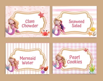 May include: Four printable food tent labels featuring mermaid illustrations and text. The labels are pink and white with gold accents. The text reads: Clam Chowder, Seaweed Salad, Mermaid Water, and Pearl Cookies.