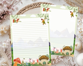 May include: Two sheets of stationery paper featuring a light green background with horizontal lines on one sheet. The design includes illustrations of small fairies, a gnome, and mushroom-shaped houses set against a landscape of mountains.