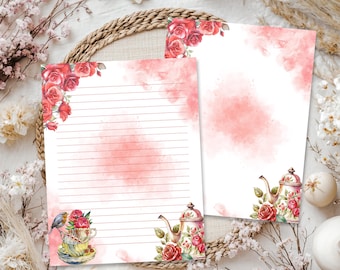 May include: Two sheets of stationery paper featuring watercolor illustrations of red roses, a teapot, and a teacup with a small bird. One sheet contains horizontal lines for writing, while the other is blank, both accented with soft pink watercolor washes.