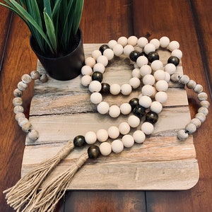 Rustic Chic Wood Bead Strand with Tassels: Perfect Touch for Modern Homes