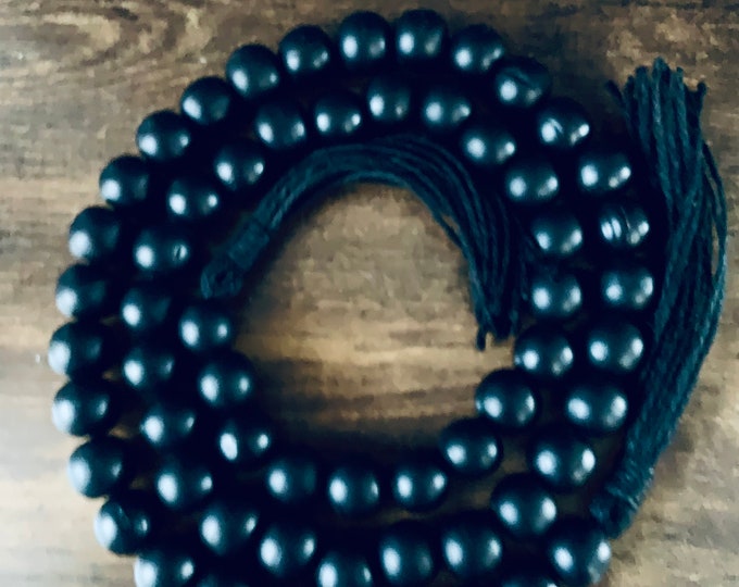 Chic and Versatile: Wooden Bead Garland with Tassels | Black Bohemian Decor