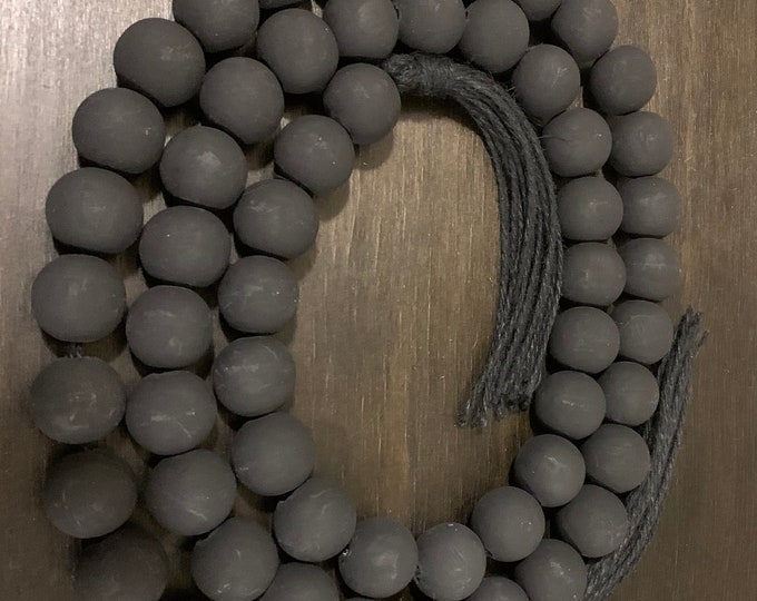 Chic and Charming Black Wood Bead Garland with Tassel Accents