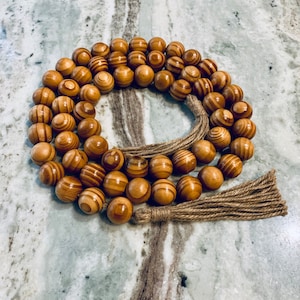Rustic Wood Bead Garland with Bohemian Jute Tassels: 64-inch Natural Home Decor