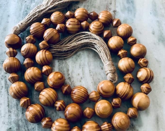 Rustic Wood Bead Garland with Jute Tassels: 58-inch Decorative Design