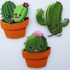 May include: Three embroidered cactus patches. One patch features a single cactus with a pink flower on top, another patch features two cacti in a pot, and the last patch features a single cactus with arms and legs.
