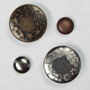May include: Four metal buttons with a star and leaf design. Two buttons are silver and two are bronze.