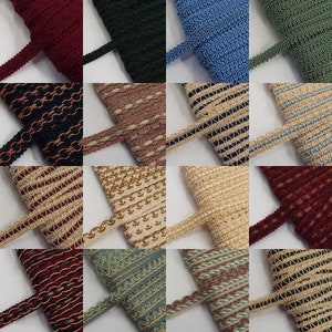 May include: A collection of 12 different types of decorative trim, each with a unique pattern and colour. The trim is made of a woven fabric and is perfect for adding a touch of elegance to any project.