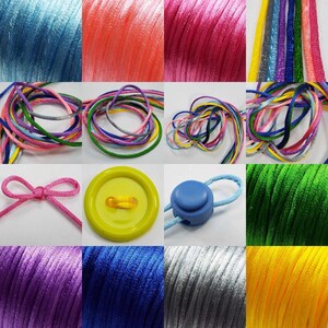 May include: Assortment of colourful satin cords, including blue, pink, red, green, yellow, purple, and grey. The cords are arranged in a grid pattern and are approximately 3 mm in diameter. A yellow button and a blue plastic cord lock are also included.