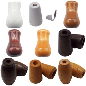 May include: Assortment of wooden finials in various colours and styles, including white, grey, brown, red, orange, and natural wood. The finials are all approximately 5 cm in length and have a smooth, polished finish.