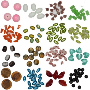 May include: Assortment of colourful glass beads in various shapes and sizes, including round, oval, teardrop, and square. The beads are perfect for jewellery making, crafting, and home decor.