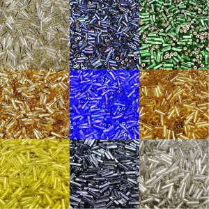 May include: Assortment of glass beads in various colours, including clear, gold, silver, blue, green, and iridescent. The beads are all cylindrical in shape and have a smooth, polished finish.
