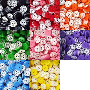 May include: Assortment of plastic buttons with a crescent moon and star design. The buttons are in various colours including black, red, pink, orange, purple, green, yellow, and blue.