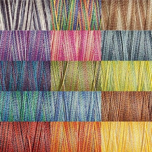 May include: A collection of 12 spools of embroidery floss, each with a different colour combination. The floss is arranged in rows of three, with each row featuring a different colour scheme. The colours include shades of blue, green, red, yellow, purple, and brown.