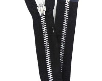 May include: A black zipper with silver teeth. The zipper is open and the two sides are separated.