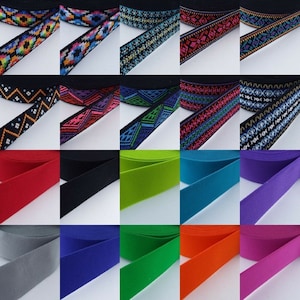 May include: Assortment of colourful elastic trim with geometric patterns and solid colours. The trim is 25mm wide and is perfect for adding a touch of style to your sewing projects.