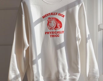 Mentally sick physically thicc  Unisex Heavy Blend™ Crewneck Sweatshirt