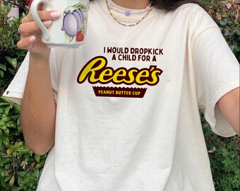 Je donnerais un coup de pied à un enfant pour un reeses Peanut butter cup T-shirt unisexe en coton épais