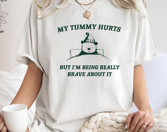 My Tummy Hurts but Im Being Really Brave About It Unisex Heavy Cotton Tee Unisex Heavy Cotton TeeRism, boneyisland funny Travel Clothing