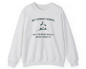 My Tummy Hurts but Im Being Really Brave About It Unisex Heavy Blend™ Crewneck SweatshirtRism, boneyisland funny Travel Clothing