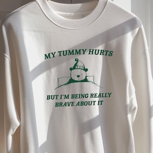 My Tummy Hurts but Im Being Really Brave About It Unisex Heavy Blend™ Crewneck