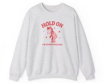 Hold on I'm overstimulated Unisex Heavy Blend Crewneck Sweatshirt