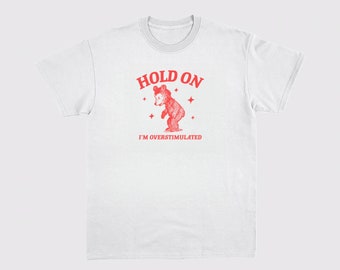 Hold on I'm overstimulated Unisex Heavy Cotton Tee